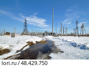 Высоковольтная одстанция во время весенней распутицы в марте. Село Шорохово. Тюменская область (2019 год). Стоковое фото, фотограф Александр Тараканов / Фотобанк Лори