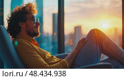 Man contemplates the sunset skyline from his apartment, lost in thought and daydreams about the future. Стоковое AI-видео, аниматор Данила Большаков / Фотобанк Лори