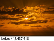 Beatiful sunset above the mediterranean sea. Sunrise with red and orange skies and the sun shining. Стоковое фото, фотограф Сергей Богомяко / Фотобанк Лори