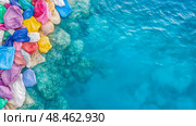 Ocean's Edge Encroached: A colorful heap of waste bags invading the pristine coastline, a stark comment on pollution and environmental endangerment. Стоковое AI-изображение, AI-художник Данила Большаков / Фотобанк Лори