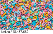 Sweet Alphabet: A Colorful Confection of Sugary Letters and Candied Delights for Baking and Treats. Стоковое AI-изображение, AI-художник Данила Большаков / Фотобанк Лори