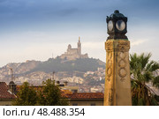 MARSEILLE, FRANCE - 10 Nov 2018 - Panoramic view on the city and the Basilique Notre-Dame de la Garde. Стоковое фото, фотограф Сергей Богомяко / Фотобанк Лори