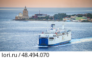 MESSINA, ITALY - NOVEMBER 06, 2018 - Panoramic view of the port in Sicily and the big ferry ship boat. Редакционное фото, фотограф Сергей Богомяко / Фотобанк Лори
