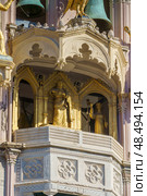 MESSINA, ITALY - NOVEMBER 06, 2018 - Decorations and golden elements of the Bell Tower of the Cathedral of Messina, Sicily. Стоковое фото, фотограф Сергей Богомяко / Фотобанк Лори
