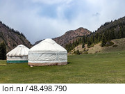 Two yurts in a mountain gorge. Nomad housing. Стоковое фото, фотограф Екатерина Якименко / Фотобанк Лори