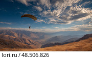 Paraglider soaring over majestic mountains under a vibrant sky. Стоковое AI-изображение, AI-художник Olga Didraga / Фотобанк Лори