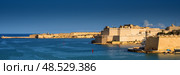 VALLETTA, MALTA - NOVEMBER 12, 2018 - In bay The Grand Harbor Tricity of Valletta, Birgu and Senglea on the island Malta. Стоковое фото, фотограф Сергей Богомяко / Фотобанк Лори