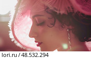 Charming woman wearing pink hat and earrings. Стоковое AI-изображение, AI-художник Данила Большаков / Фотобанк Лори