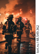 A group of firefighters in full gear are seen walking down a street, ready to respond to emergency situations. Стоковое AI-изображение, AI-художник Данила Большаков / Фотобанк Лори