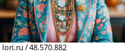 Elegant floral jacket with layered turquoise & pearl necklace, luxurious adornment, for high fashion concept. Стоковое AI-изображение, AI-художник Данила Большаков / Фотобанк Лори