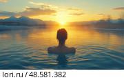 A person enjoys a soothing soak in a natural hot spring while the sun rises over distant mountains, creating a peaceful and refreshing ambiance. Стоковое AI-изображение, AI-художник Данила Большаков / Фотобанк Лори