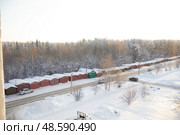 Ряд гаражей зимой на фоне леса. Стоковое фото, фотограф Андрюков Антон / Фотобанк Лори
