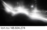 Bright, flowing light patterns sweep across a dark backdrop, evoking energy and momentum in a vibrant urban environment. Стоковое AI-изображение, AI-художник Данила Большаков / Фотобанк Лори