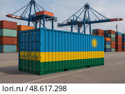 Грузовой контейнер с флагом Руанды в морском порту. Стоковое AI-изображение, AI-художник Башкирова Анна / Фотобанк Лори