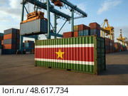 Грузовой контейнер с флагом Суринама в морском порту. Стоковое AI-изображение, AI-художник Башкирова Анна / Фотобанк Лори