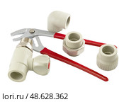 Водопроводный кран и гаечный ключ на белом фоне.  Water faucet and a wrench on a white background.d. Стоковое фото, фотограф Татьяна Д / Фотобанк Лори