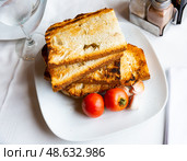 Kitchen table with cooking tools and fresh vegetables. Pan Con tomate, bread with tomato and garlic. Catalonian cuisine. Spain. Стоковое фото, фотограф Яков Филимонов / Фотобанк Лори