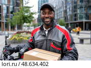 A man wearing a black jacket and a red. Стоковое AI-изображение, AI-художник Ярославский Максим / Фотобанк Лори