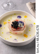 A traditional dish in Peru, ceviche, elegant appetizer of fresh fish in lime sauce leche de tigre, black caviar. Стоковое фото, фотограф Наталья Угрюмова / Фотобанк Лори
