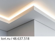 Ceiling close-up. Classic interior. LED Retrofit Bulb into Ceiling Fixture. Cornice. Installing. Decorative Ceiling crown molding intersection. Wall Corner Architecture Decor. Angular ceiling skirting. Стоковое AI-изображение, AI-художник Марина Демидюк / Фотобанк Лори