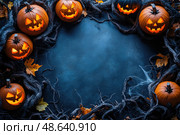 Carved Halloween pumpkins glow bright against a dark background, decorated with cobwebs and autumn leaves, creating a festive atmosphere. Стоковое AI-изображение, AI-художник Данила Большаков / Фотобанк Лори