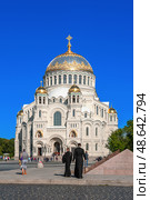 Kronstadt, Russia, June 11, 2015. Stavropigial St. Nicholas Sea Cathedral of Kronstadt. The temple was consecrated in 1913. UNESCO World Heritage Site. Редакционное фото, фотограф Оксана Медведева / Фотобанк Лори