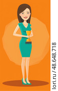 A woman wearing a green dress stands proudly holding a trophy, showcasing her accomplishment against a bright orange backdrop. Стоковое AI-изображение, AI-художник Данила Большаков / Фотобанк Лори