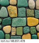 Explore an exquisite assortment of unakite, epidosite, and various mineral stones showcasing vivid colors and unique textures, perfect for mineral enthusiasts and collectors Generative AI. Стоковое AI-изображение, AI-художник Юлия Петровская / Фотобанк Лори