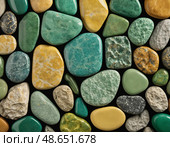 A striking arrangement of unakite mineral stones featuring vivid colors and unique textures Generative AI. Стоковое AI-изображение, AI-художник Юлия Петровская / Фотобанк Лори
