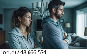 Young couple having relationship problems at home are arguing. Стоковое AI-изображение, AI-художник Юрий Поздников / Фотобанк Лори