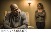 Couple experiencing relationship difficulties sitting separately at home. Стоковое AI-изображение, AI-художник Юрий Поздников / Фотобанк Лори
