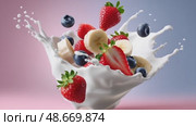 Milk splashing with fresh fruits on colorful background. Стоковое AI-видео, аниматор Юрий Поздников / Фотобанк Лори
