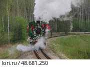 Паровоз Гр-318 движется тендером вперед по станции Екатеринбург-Детский, Екатеринбургская ДЖД, Свердловская область. Редакционное фото, фотограф Алексей Иванов / Фотобанк Лори