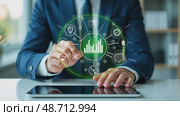 A person in a business suit working on a laptop with virtual icons related to data analysis, showcasing charts, graphs, diagrams, market trends and other finance symbols. Стоковое AI-видео, аниматор Sergey Grishin / Фотобанк Лори