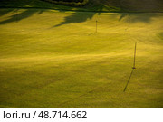 Golf course in green field. Стоковое фото, фотограф Sebastian Duda / PantherMedia / Фотобанк Лори