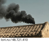 Dark smoke fills the sky above the Vatican, indicating the selection of a new pope. Crowds gather in hope and prayer, awaiting news of the next spiritual leader Generative AI. Стоковое AI-изображение, AI-художник Юлия Петровская / Фотобанк Лори