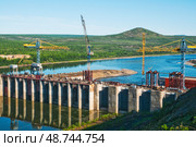 Строительство Усть-Среднеканской ГЭС на Колыме (2012 год). Редакционное фото, фотограф Павел Просянов / Фотобанк Лори
