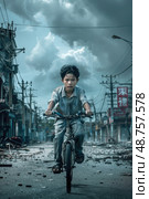 A young boy rides a bicycle down a street littered with debris in a city ravaged by a disaster. The sky is overcast and gloomy, reflecting the somber mood. Стоковое AI-изображение, AI-художник Данила Большаков / Фотобанк Лори