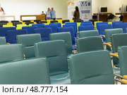 Blue chairs in rows. A row of empty blue chairs in a waiting area. Стоковое фото, фотограф Роготнева Виктория / Фотобанк Лори