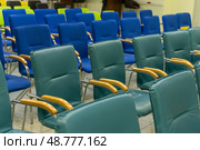 Blue chairs in rows. A row of empty blue chairs in a waiting area. Стоковое фото, фотограф Роготнева Виктория / Фотобанк Лори