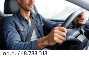 Man driving a car safely wearing seatbelt. Стоковое AI-изображение, AI-художник Юрий Поздников / Фотобанк Лори