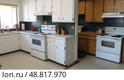 mismatched dated kitchen ai generated. Стоковое AI-изображение, AI-художник Vectorwin / Фотобанк Лори