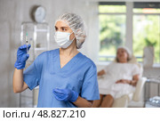 Young doctor with mask and syringe. Стоковое фото, фотограф Яков Филимонов / Фотобанк Лори