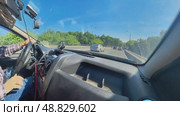 A car is driving along a city overpass on a sunny day in the early morning. The camera is 360 degrees. Russia. Moscow 05/25/2025. Стоковое видео, видеограф Ярославский Максим / Фотобанк Лори