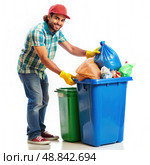 Man in Hard Hat Dumping Garbage Into Blue Trash Can. Generative AI. Стоковое AI-изображение, AI-художник Roman Zavorotny / Фотобанк Лори