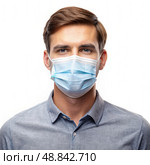 Man Wearing Blue Face Mask. Generative AI. Стоковое AI-изображение, AI-художник Roman Zavorotny / Фотобанк Лори