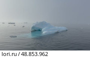 Big Iceberg in Antarctica Winter Scenery, Amazing Shape Ice Formation of Massive Large Enormous Blue Icebergs in Antarctic Peninsula Landscape Seascape with Ocean Sea Water. Стоковое видео, видеограф Vladimir / Фотобанк Лори