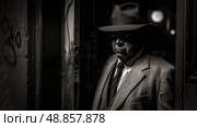 A man in a fedora stands in a dark doorway, his face partially obscured by the shadows. Стоковое AI-изображение, AI-художник Данила Большаков / Фотобанк Лори