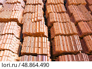Pallets with bricks in a warehouse of a brick factory. View from above. Стоковое фото, фотограф Евгений Ткачёв / Фотобанк Лори