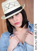 Pouting woman in a hat. Стоковое фото, агентство Ingram Publishing / Фотобанк Лори